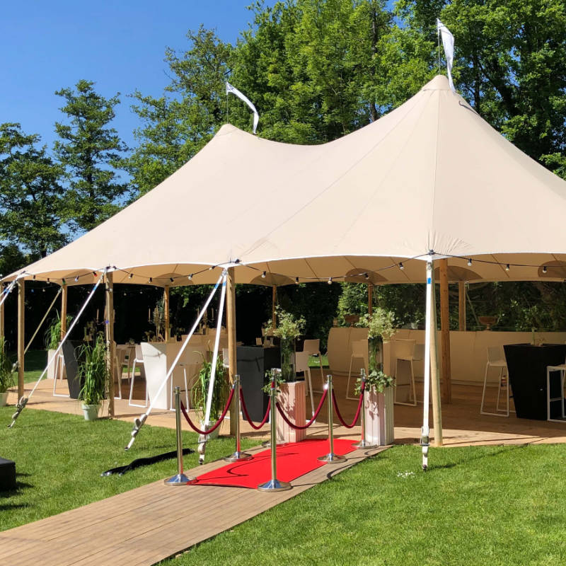 Sailcloth Event Tent by Canvas Camp Luxury Outdoor Canopy with red carpet