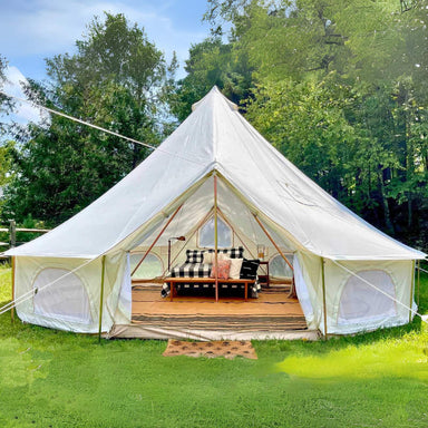 Yurt Tent Zephyr by Life in Tents 19ft front view on grass by trees