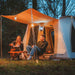 A Frame Tent Big Horn by Canvas Camp man and woman couple at night