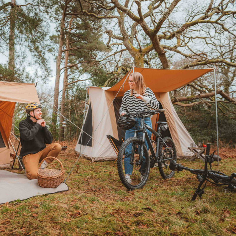 A Frame Tent Big Horn by Canvas Camp with man and woman at campsite