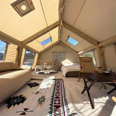 Koala Air Tent 7 beige interior with couch bed and table