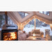 RBM Koala Hub beige interior with woman on bed and fireplace