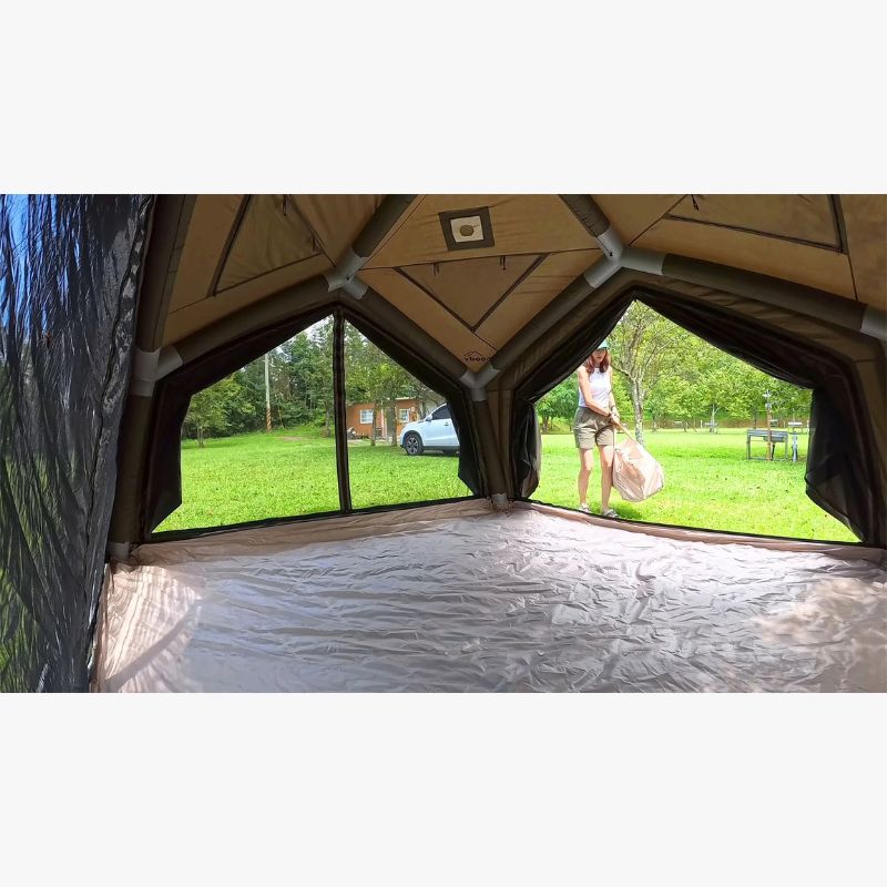 RBM Koala Hub khaki empty interior with woman outside