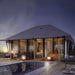 Safari Tent Eclipse by Luna Glamping front view at night by pool