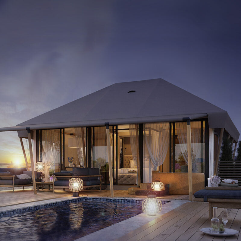 Safari Tent Eclipse by Luna Glamping front view at night by pool