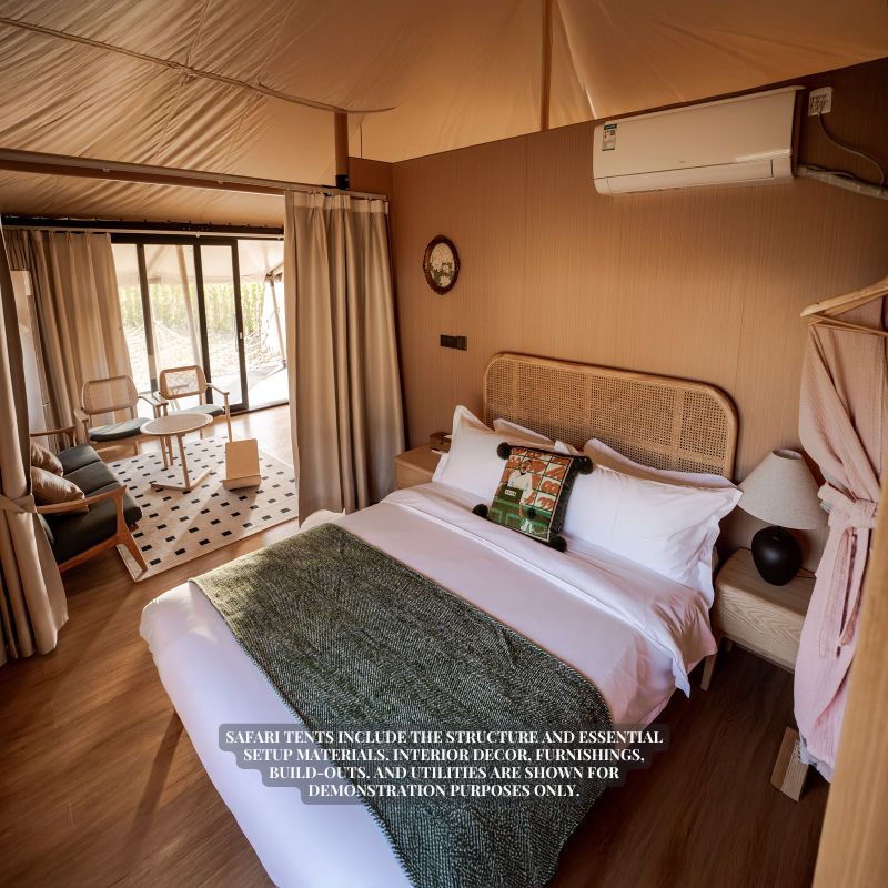 Safari Tent Eclipse by Luna Glamping interior view of bedroom with bed and air conditioner ac