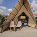 Safari Tent Equinox II by Luna Glamping close up front view with chairs on wood deck