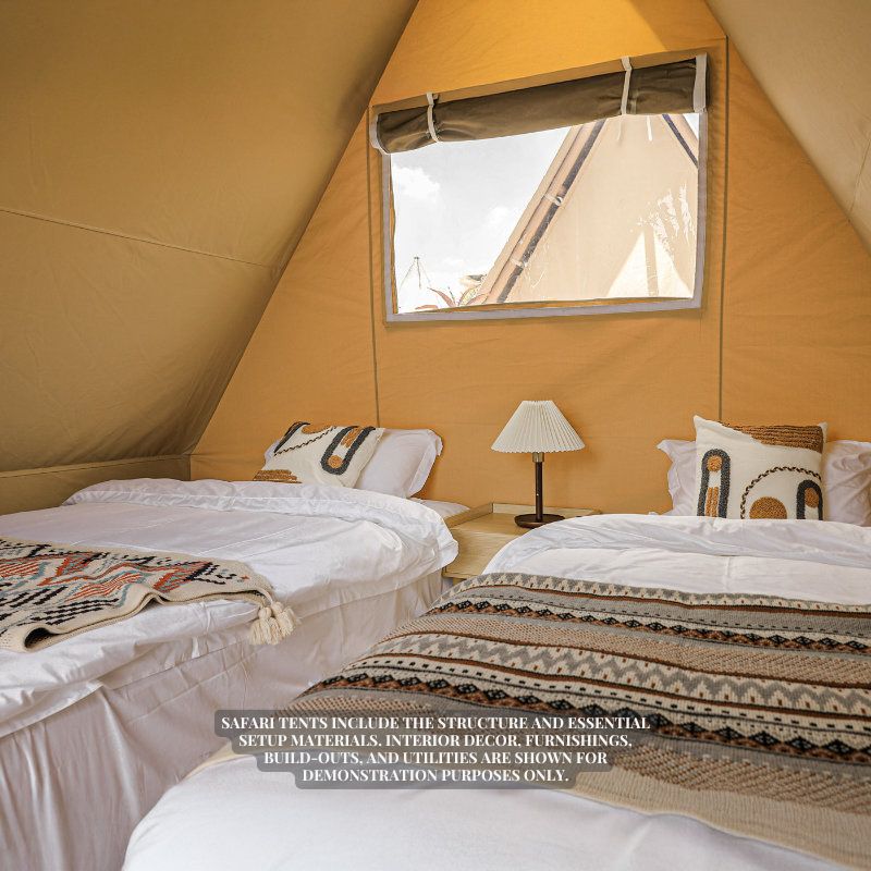Safari Tent Equinox II by Luna Glamping interior front left view with two beds and a lamp