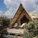 Safari Tent Equinox I by Luna Glamping front left view with two chairs on deck