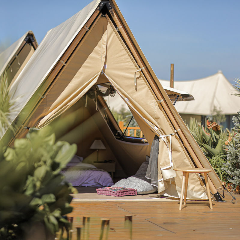 Safari Tent Equinox I by Luna Glamping front view of interior with bed