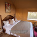 Safari Tent Solstice I by Luna Glamping interior view of bedroom