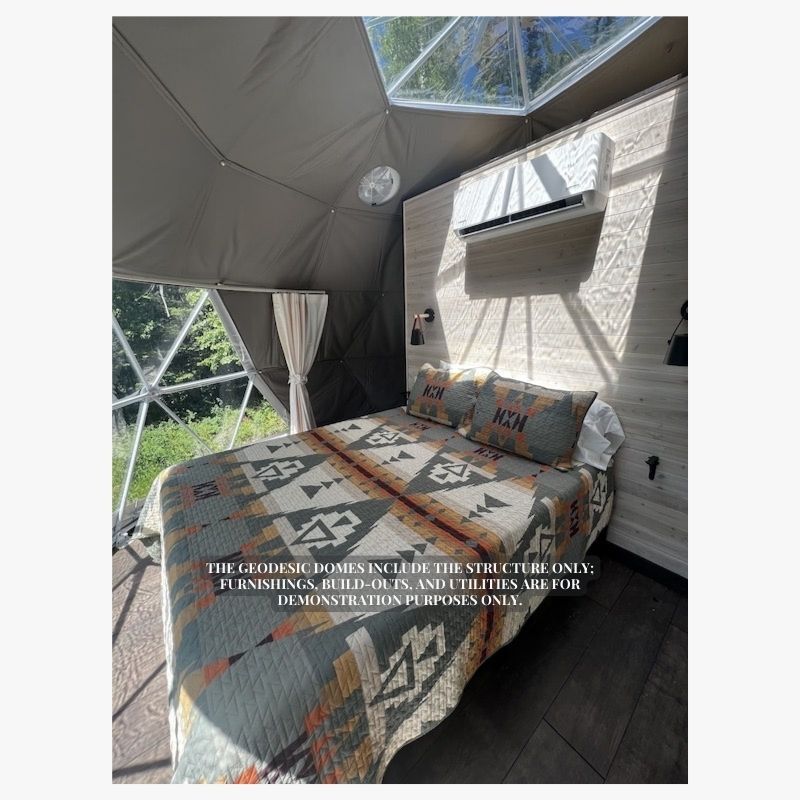 Stargazing Dome 16' Luna Glamping interior bedroom with bed and air conditioner