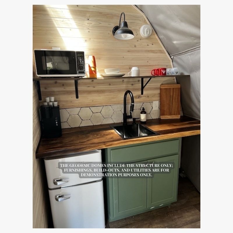 Stargazing Dome 16' Luna Glamping interior kitchen with sink fridge and microwave