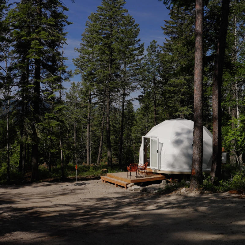 Stargazing Dome 16' Luna Glamping white in woods daytime