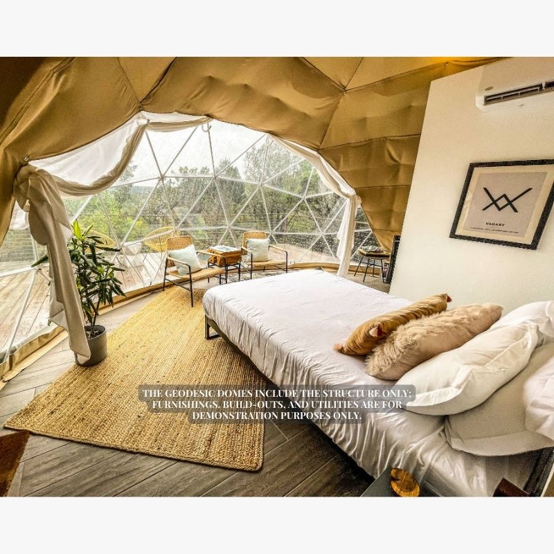 Stargazing Dome 19' Luna Glamping white interior bedroom with bed rug and two chairs