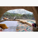 Stargazing Dome 19' Luna Glamping white interior view of wood deck and hot tub