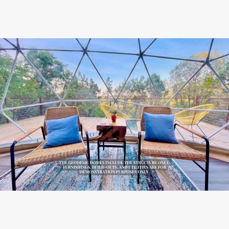 Stargazing Dome 19' Luna Glamping white interior view through front window with two chairs