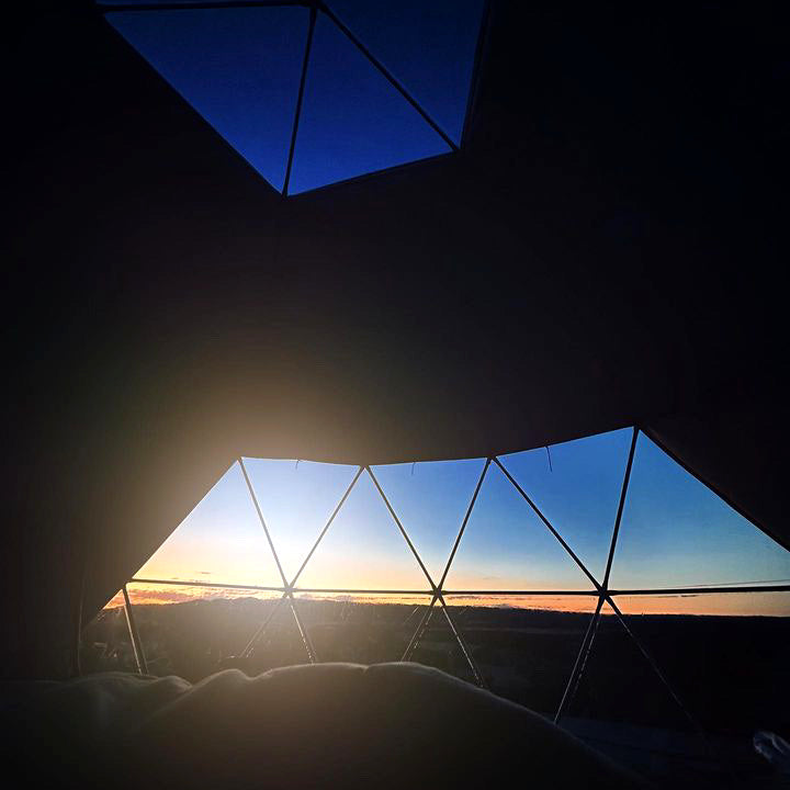 Stargazing Dome 23' Luna Glamping interior view of sunrise sunset