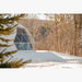 Stargazing Dome 23' Luna Glamping white with snow in woods daytime