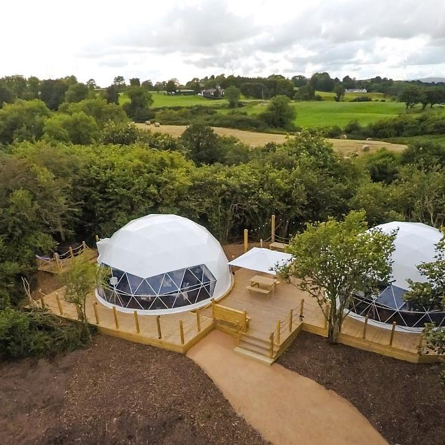 Stargazing Dome 26' Luna Glamping in white drone view on wood deck