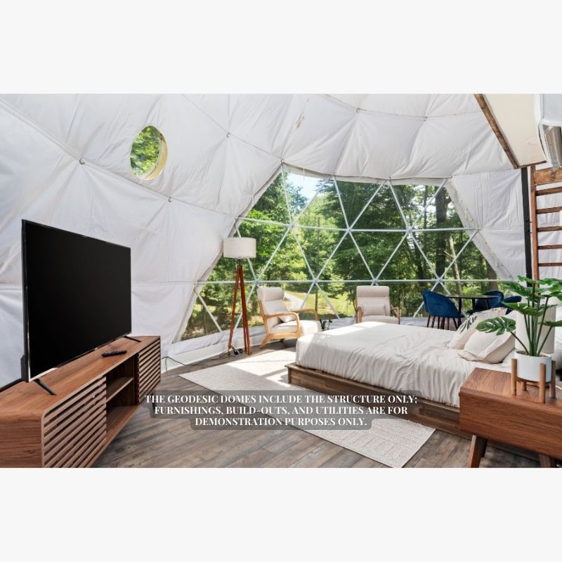 Stargazing Dome 26' Luna Glamping in white interior view from front entrance with bed tv and ladder