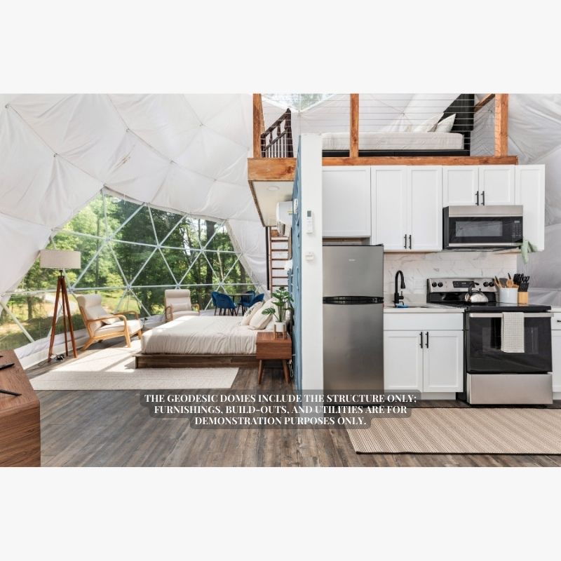 Stargazing Dome 26' Luna Glamping in white interior view of bed and kitchen with fridge sink and oven