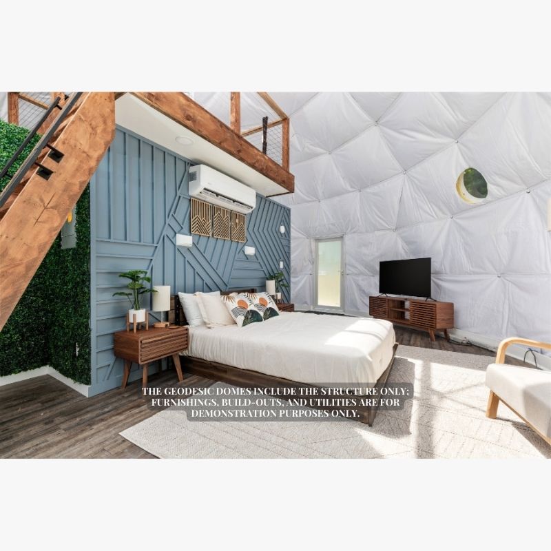 Stargazing Dome 26' Luna Glamping in white interior view of front entrance with bed loft tv and air conditioner