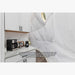 Stargazing Dome 26' Luna Glamping in white interior view of kitchen with coffee pot
