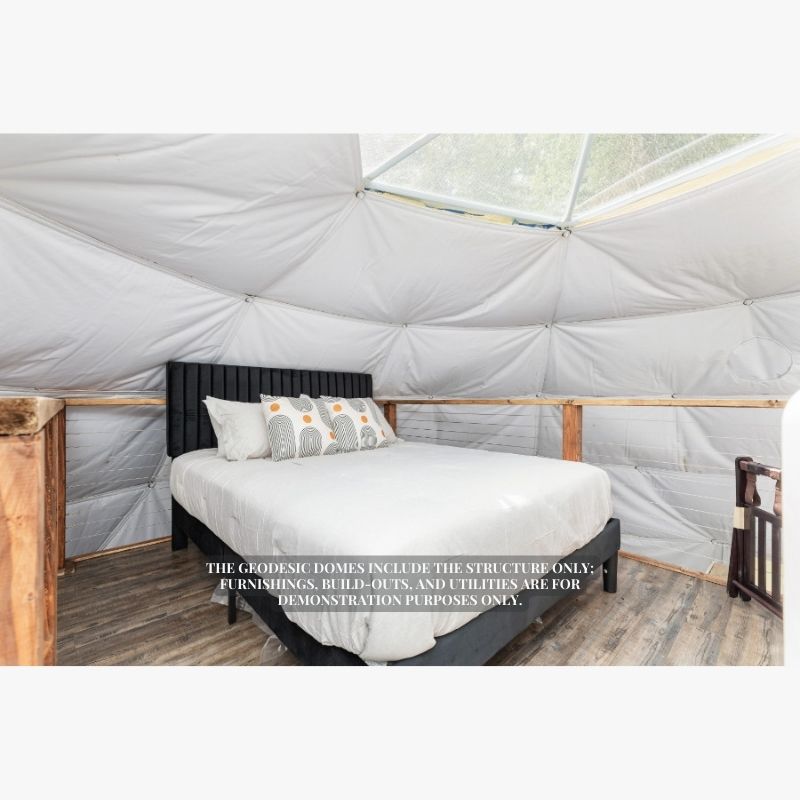 Stargazing Dome 26' Luna Glamping in white interior view with bed in loft