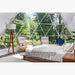 Stargazing Dome 26' Luna Glamping in white interior view with bed two chairs and lamp