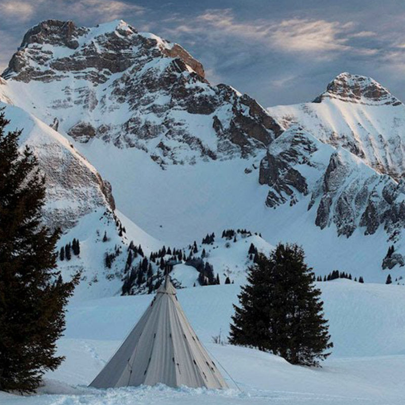 Teepee Tent Tipi 600 by Canvas Camp in the mountains on snow closed door
