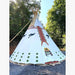 Teepee Tent by Nomadic Tipi Makers The Four Direction design front right view on gravel in woods