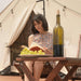 Wall Tent Canvas Camp woman with grapes wine and book