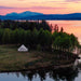 Yurt Tent Sibley Apex by Canvas Camp birds eye view drone view by lake at sunset