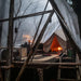Yurt Tent Sibley Pro 400 by Canvas Camp in woods on wood deck