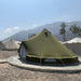 Yurt Tent Sibley Pro 500 by Canvas Camp Green on concrete platform at resort sunny day