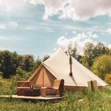 Yurt Tent Sibley Pro 500 by Canvas Camp front left view on wood deck in grassy field
