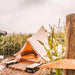 Yurt Tent Sibley Ultimate 450 by Canvas Camp in cornfield on wood chips at campsite