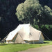 Yurt Tent Sibley Ultimate 600 twin by Canvas Camp on grass by pathway and large trees