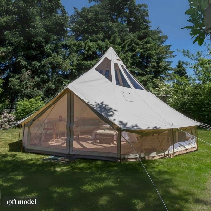 Yurt Tent Stella Stargazer by Life in Tents 19ft front left view on grass near trees in shade