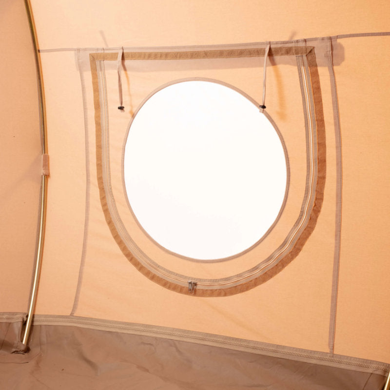 Yurt Tent Temple Apex by Canvas Camp stock photo interior view of closed mesh window