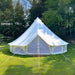 Yurt Tent Zephyr by Life in Tents 19ft front view closed on grass by trees