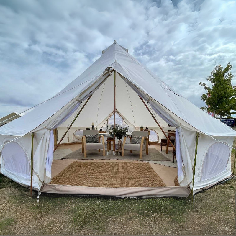 Yurt Tent Zephyr by Life in Tents 19ft front view of interior on grass cloudy