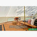 Yurt Tent Zephyr by Life in Tents 19ft interior left side view with chair and ottoman