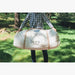 Yurt Tent Zephyr by Life in Tents man holding storage bag outside on grass